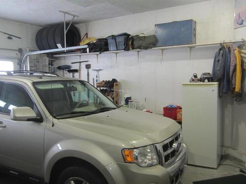 150 Pipestone Drive, Millet, AB - Indoor Photo Showing Garage