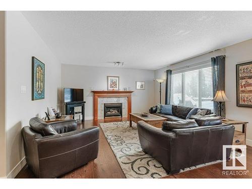 805 Proctor Wynd, Edmonton, AB - Indoor Photo Showing Living Room With Fireplace