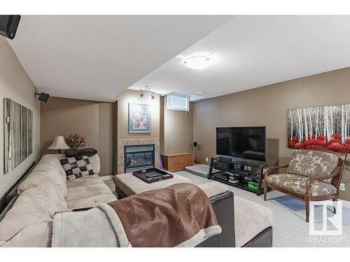 805 Proctor Wynd, Edmonton, AB - Indoor Photo Showing Living Room With Fireplace