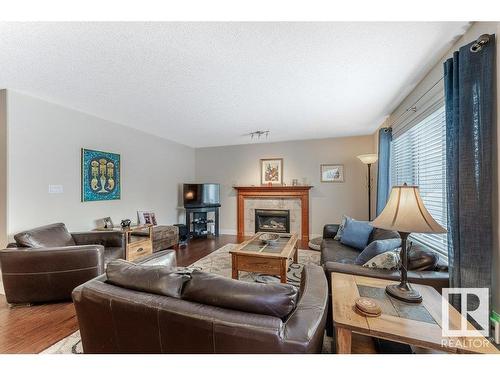 805 Proctor Wynd, Edmonton, AB - Indoor Photo Showing Living Room With Fireplace