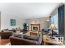 805 Proctor Wynd, Edmonton, AB  - Indoor Photo Showing Living Room With Fireplace 