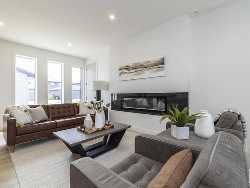 4541 Knight Wynd, Edmonton, AB - Indoor Photo Showing Living Room With Fireplace