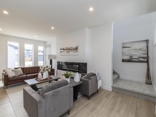 4541 Knight Wynd, Edmonton, AB - Indoor Photo Showing Living Room With Fireplace