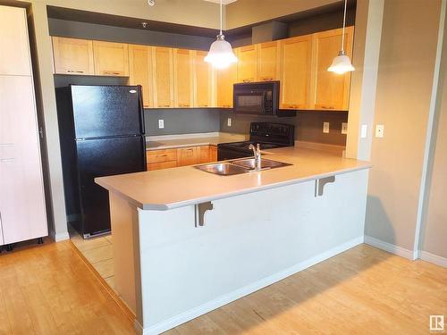 1-311 4245 139 Avenue, Edmonton, AB - Indoor Photo Showing Kitchen With Double Sink