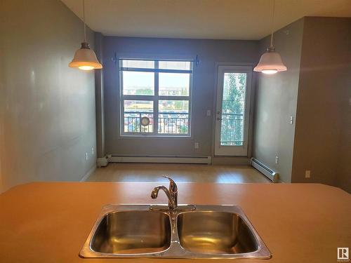 1-311 4245 139 Avenue, Edmonton, AB - Indoor Photo Showing Kitchen With Double Sink