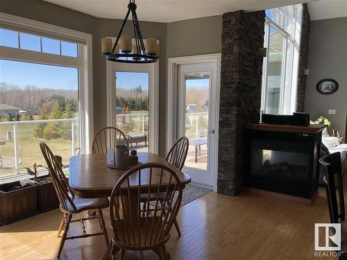 61314 Rr 463, Rural Bonnyville M.D., AB - Indoor Photo Showing Dining Room With Fireplace