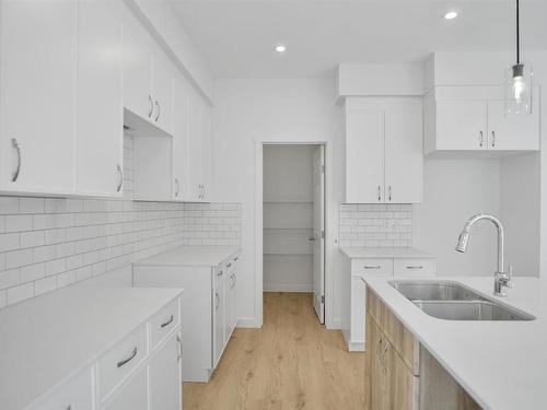 22825 82A Avenue, Edmonton, AB - Indoor Photo Showing Kitchen With Double Sink