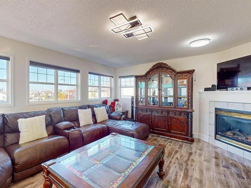 503 89 St, Edmonton, AB - Indoor Photo Showing Living Room With Fireplace