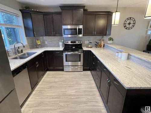 4135 43 Avenue, Drayton Valley, AB - Indoor Photo Showing Kitchen With Stainless Steel Kitchen With Double Sink