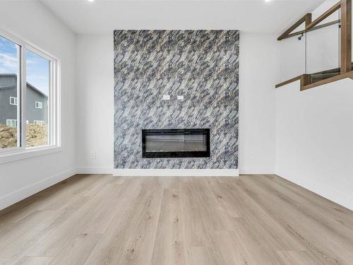 2521 62 Avenue, Rural Leduc County, AB - Indoor Photo Showing Living Room With Fireplace