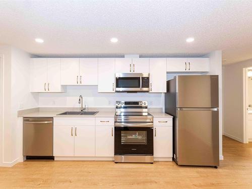 9618 Colak Link Link, Edmonton, AB - Indoor Photo Showing Kitchen With Double Sink