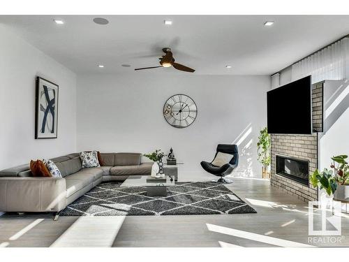 5819 28 Street, Rural Leduc County, AB - Indoor Photo Showing Living Room With Fireplace