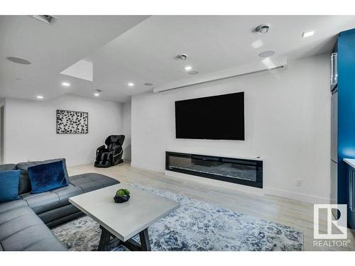 5819 28 Street, Rural Leduc County, AB - Indoor Photo Showing Living Room With Fireplace