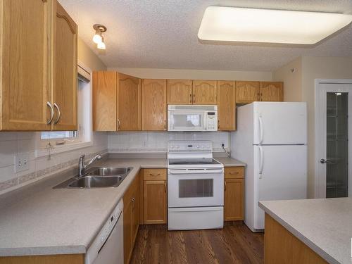 417 2420 108 Street Nw, Edmonton, AB - Indoor Photo Showing Kitchen With Double Sink