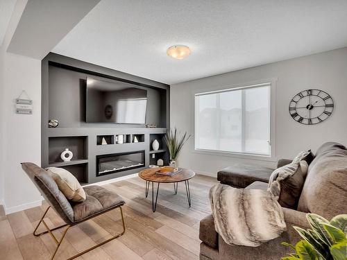 164 Secord Drive, Edmonton, AB - Indoor Photo Showing Living Room With Fireplace