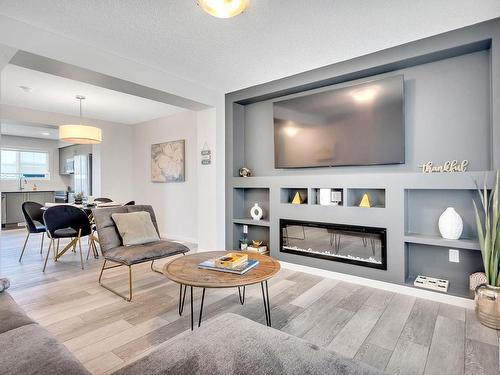 164 Secord Drive, Edmonton, AB - Indoor Photo Showing Living Room With Fireplace