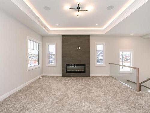 202 Edgewater Circle, Leduc, AB - Indoor With Fireplace