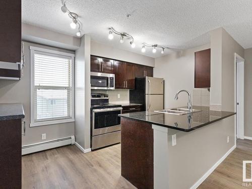 337 3315 James Mowatt Trail, Edmonton, AB - Indoor Photo Showing Kitchen