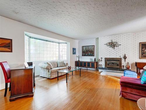 10635 59 Street, Edmonton, AB - Indoor Photo Showing Living Room With Fireplace