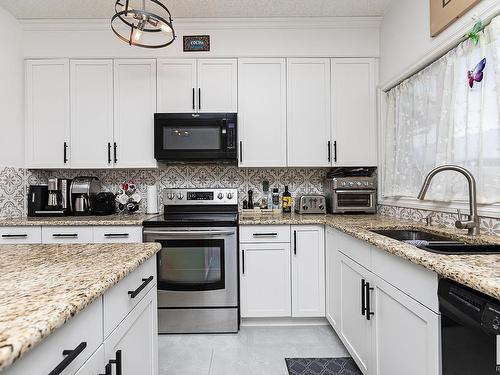 4893 Terwillegar Common, Edmonton, AB - Indoor Photo Showing Kitchen With Double Sink With Upgraded Kitchen