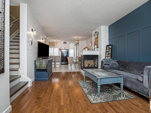 4893 Terwillegar Common, Edmonton, AB - Indoor Photo Showing Living Room With Fireplace