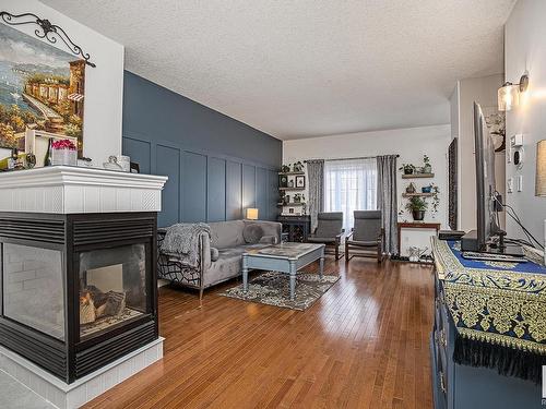 4893 Terwillegar Common, Edmonton, AB - Indoor Photo Showing Living Room With Fireplace