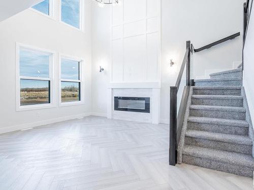 8616 181 Avenue, Edmonton, AB - Indoor Photo Showing Other Room With Fireplace