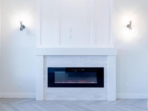 8616 181 Avenue, Edmonton, AB - Indoor Photo Showing Living Room With Fireplace