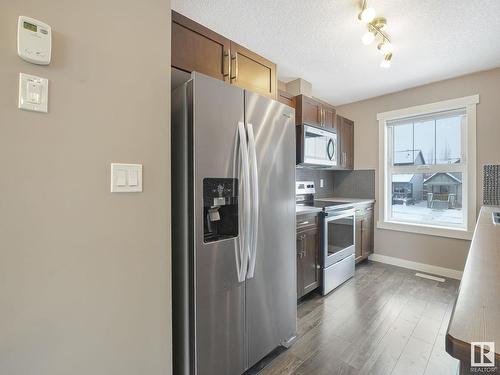 123 401 Southfork Drive, Leduc, AB - Indoor Photo Showing Kitchen