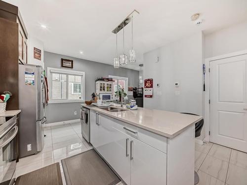 24 2803 14 Avenue, Edmonton, AB - Indoor Photo Showing Kitchen With Double Sink