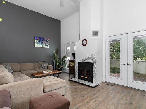 3016 108 Street, Edmonton, AB - Indoor Photo Showing Living Room With Fireplace