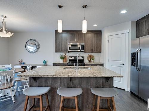 56 Redding Way, Fort Saskatchewan, AB - Indoor Photo Showing Kitchen With Upgraded Kitchen