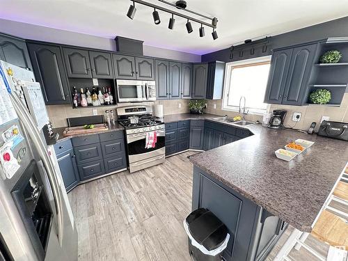 10824 106A, Westlock, AB - Indoor Photo Showing Kitchen With Double Sink