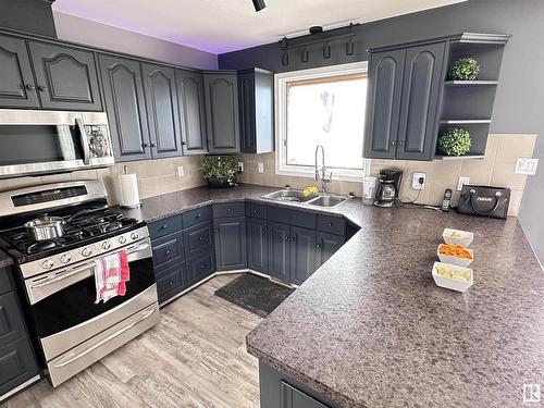 10824 106A, Westlock, AB - Indoor Photo Showing Kitchen With Double Sink