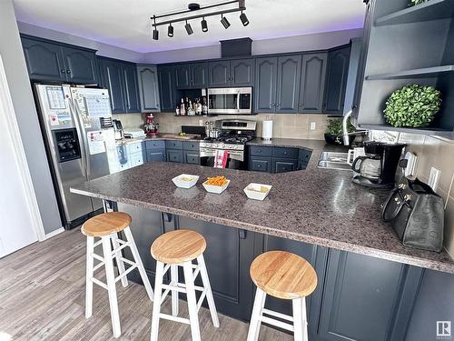 10824 106A Avenue, Westlock, AB - Indoor Photo Showing Kitchen With Double Sink