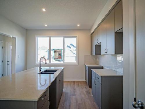 21 Westpark Drive, Fort Saskatchewan, AB - Indoor Photo Showing Kitchen With Double Sink