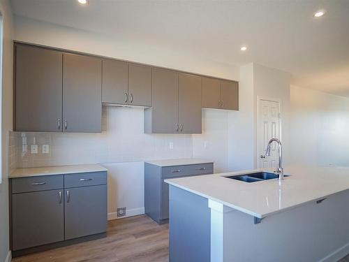 21 Westpark Drive, Fort Saskatchewan, AB - Indoor Photo Showing Kitchen With Double Sink