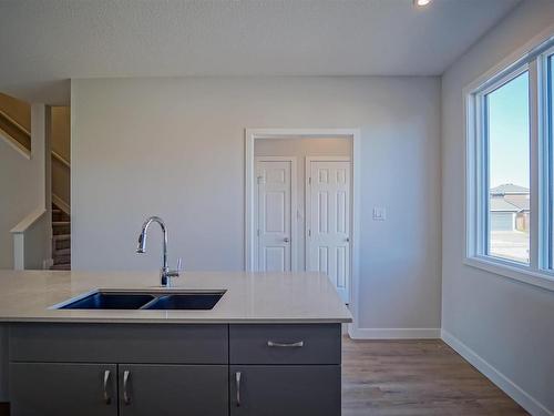 21 Westpark Drive, Fort Saskatchewan, AB - Indoor Photo Showing Kitchen With Double Sink