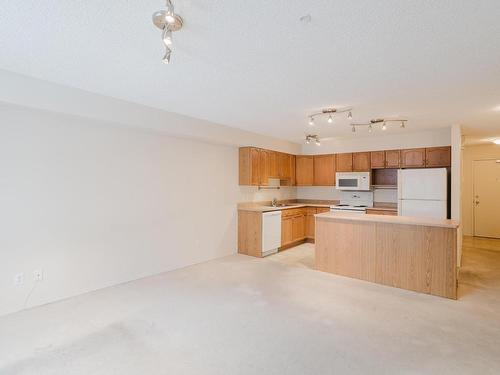 209 10311 111 Street, Edmonton, AB - Indoor Photo Showing Kitchen