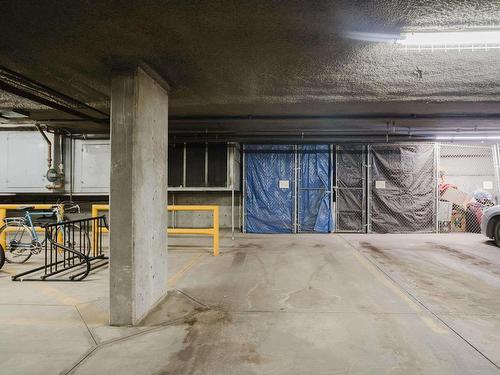 209 10311 111 Street, Edmonton, AB - Indoor Photo Showing Garage