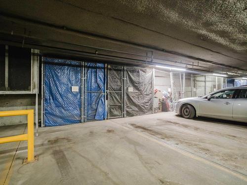 209 10311 111 Street, Edmonton, AB - Indoor Photo Showing Garage