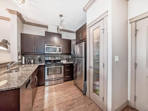 344 10121 80 Avenue, Edmonton, AB - Indoor Photo Showing Kitchen With Double Sink