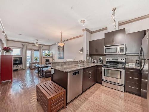 344 10121 80 Avenue, Edmonton, AB - Indoor Photo Showing Kitchen With Double Sink