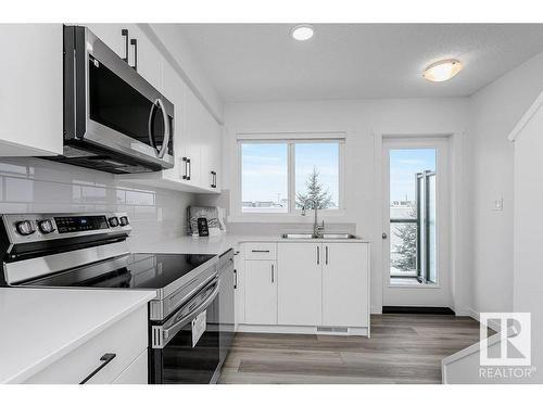 41 1530 Tamarack Boulevard Nw, Edmonton, AB - Indoor Photo Showing Kitchen With Stainless Steel Kitchen With Double Sink