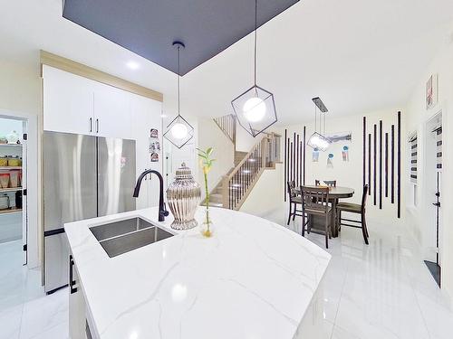 4202 38A Street, Beaumont, AB - Indoor Photo Showing Kitchen With Double Sink With Upgraded Kitchen