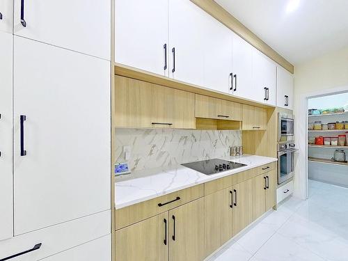 4202 38A Street, Beaumont, AB - Indoor Photo Showing Kitchen