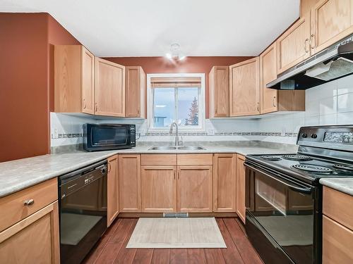 28 225 Blackburn E, Edmonton, AB - Indoor Photo Showing Kitchen With Double Sink