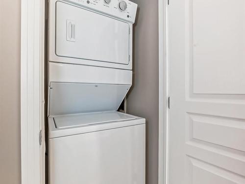 345 4827 104A Street, Edmonton, AB - Indoor Photo Showing Laundry Room