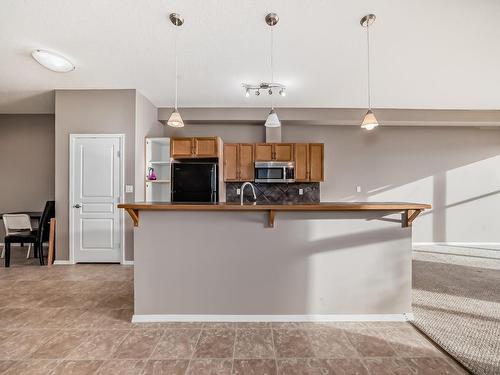 345 4827 104A Street, Edmonton, AB - Indoor Photo Showing Kitchen