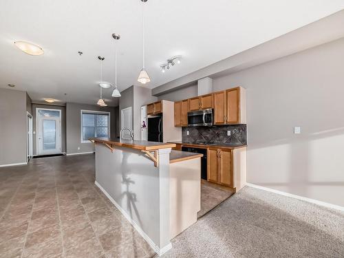 345 4827 104A Street, Edmonton, AB - Indoor Photo Showing Kitchen With Upgraded Kitchen